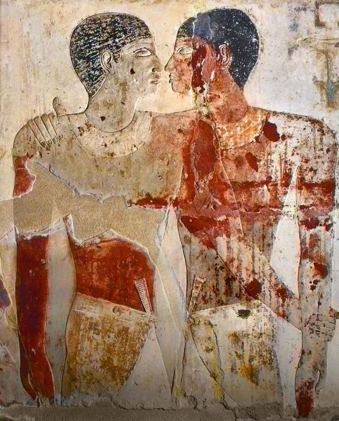 Two Egyptian men embracing