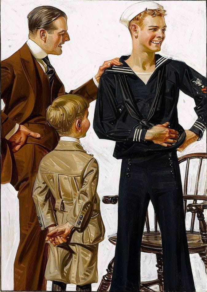 Two young men and a boy standing