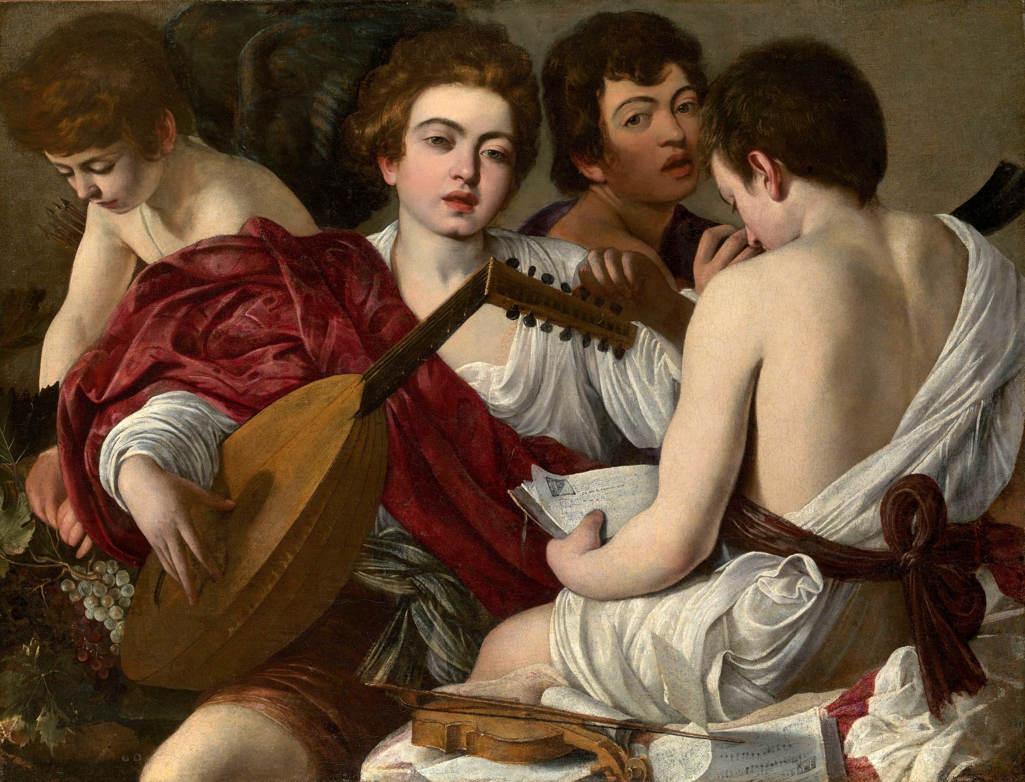 Group of four young men making music