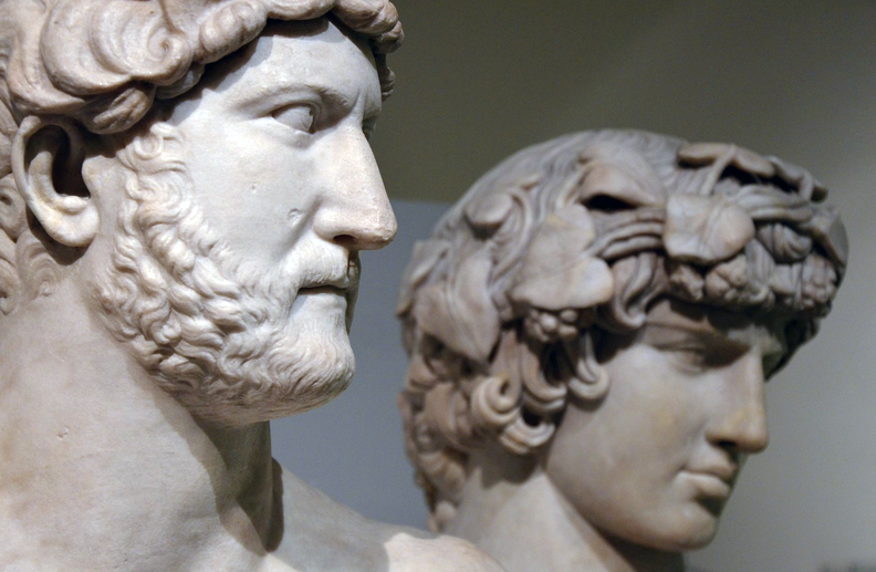 Heads of two marble sculptures depicting two Roman men